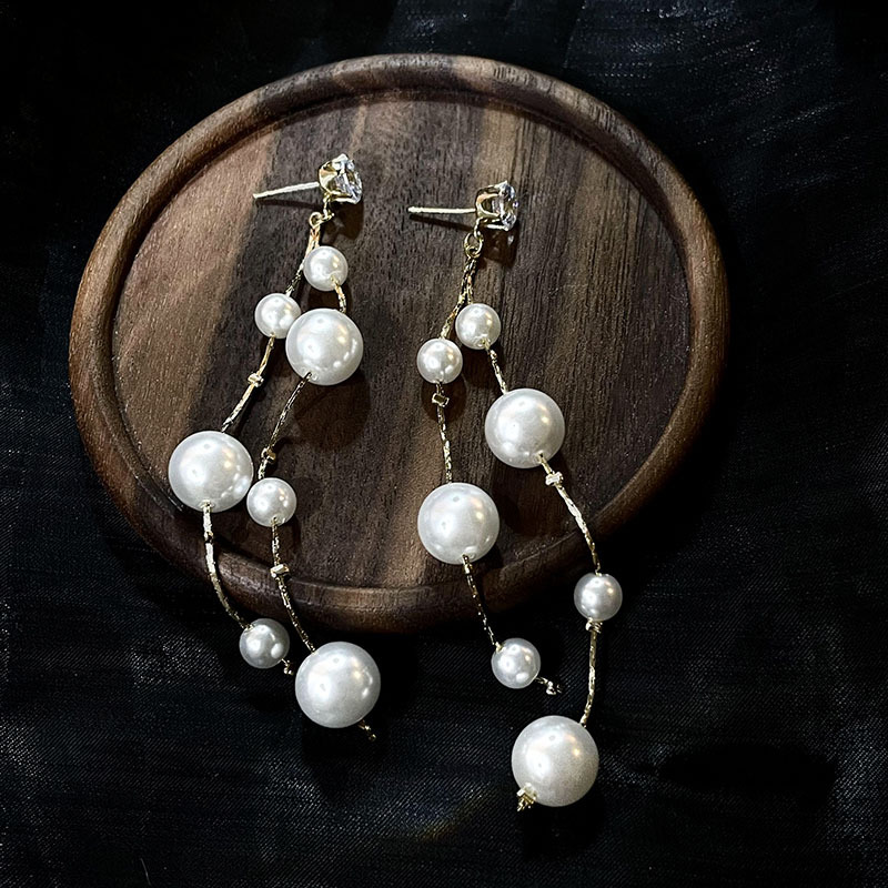 科技與時(shí)尚完美融合，最新長款珍珠耳飾款式亮相！